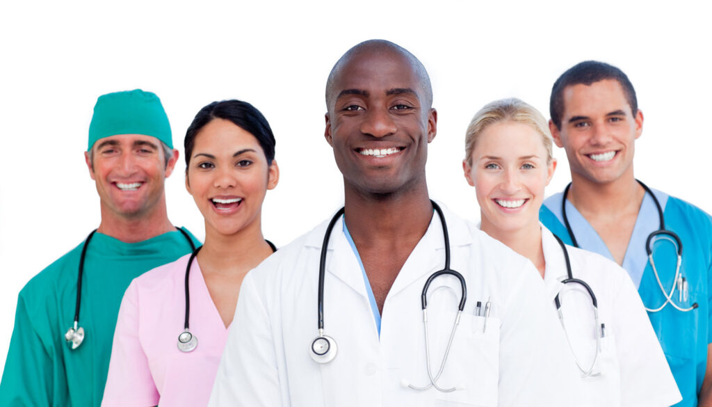 A group of doctors and nurses standing together.